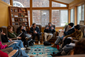 Campus Commons participants talk in a circle.